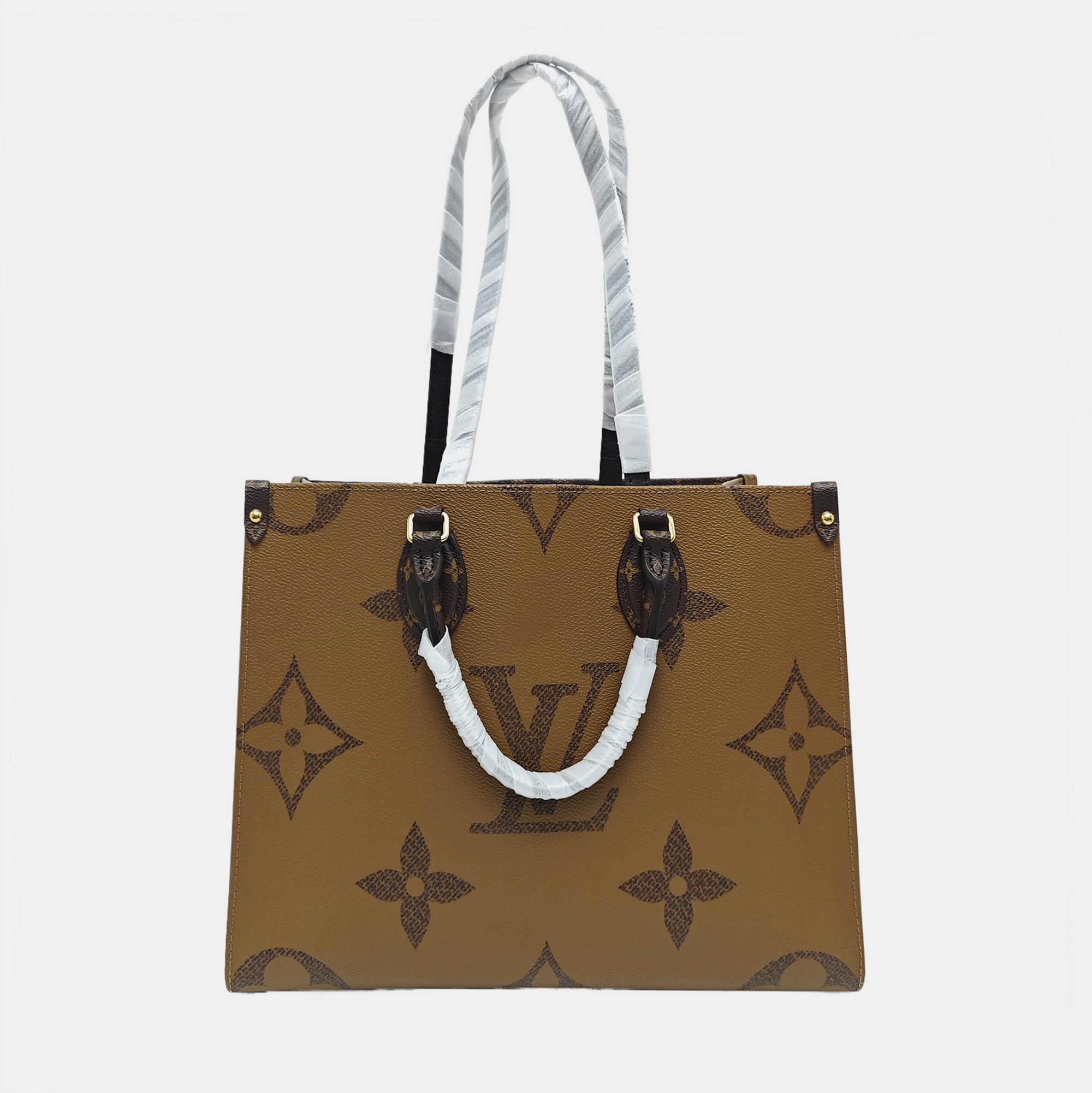 ONTHEGO MM Monogram Coated Canvas Brown
