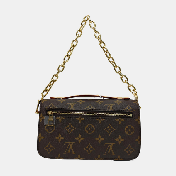 MÉTIS EAST WEST Monogram Coated Canvas Brown