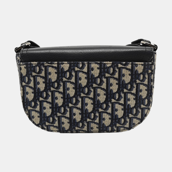 Authenticated pre-owned  Saddle Mini Monogram Canvas Beige - Shoulder Bag at Looply