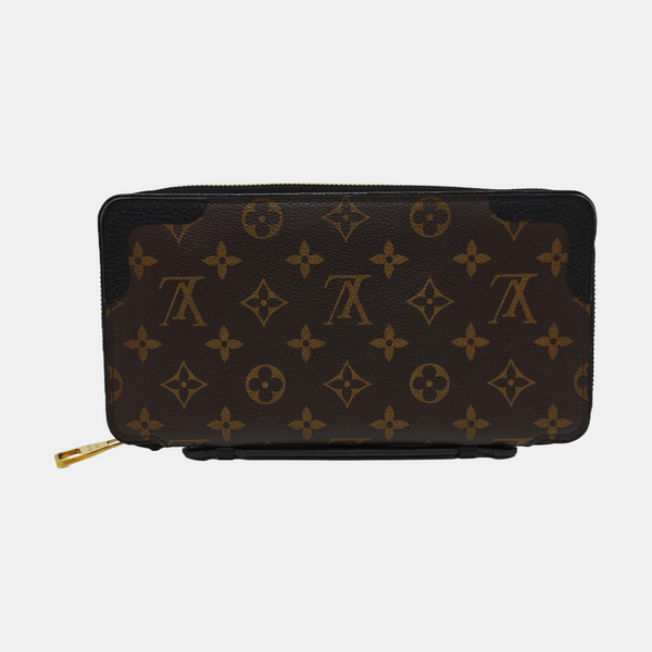 Monogram Coated Canvas Clutch Brown