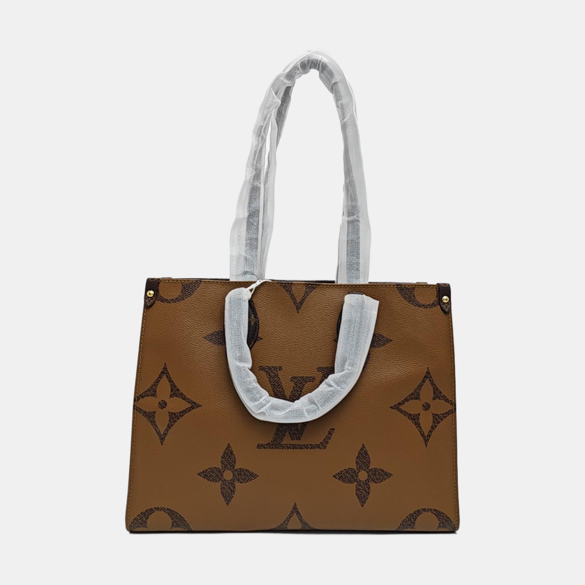 ONTHEGO MM Monogram Coated Canvas Brown
