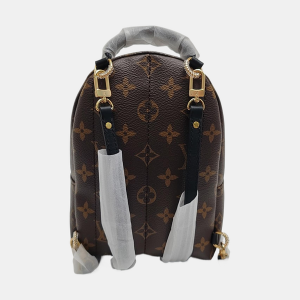 PALM SPRINGS Mini Monogram Coated Canvas Brown