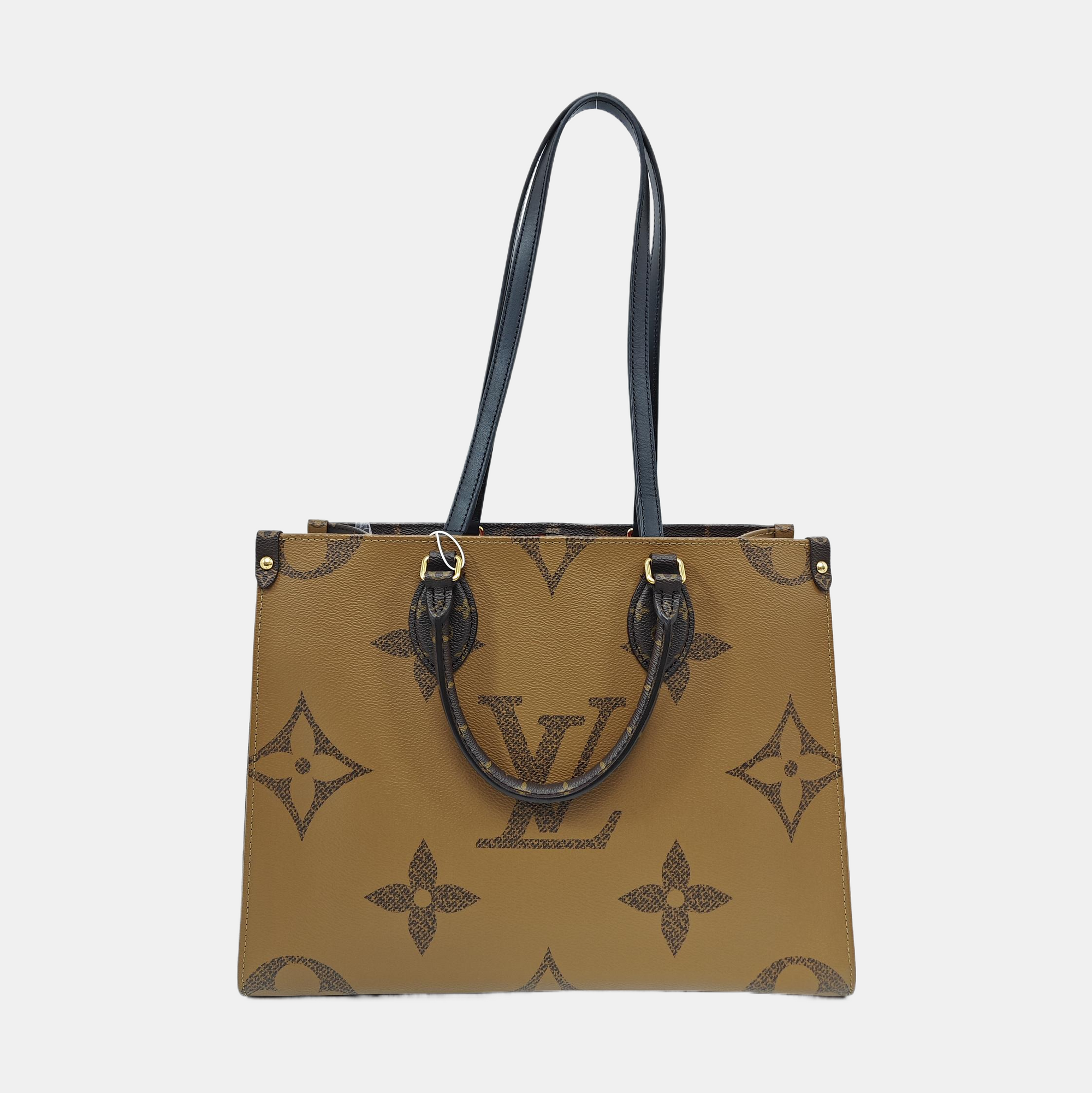 ONTHEGO MM Monogram Coated Canvas Brown