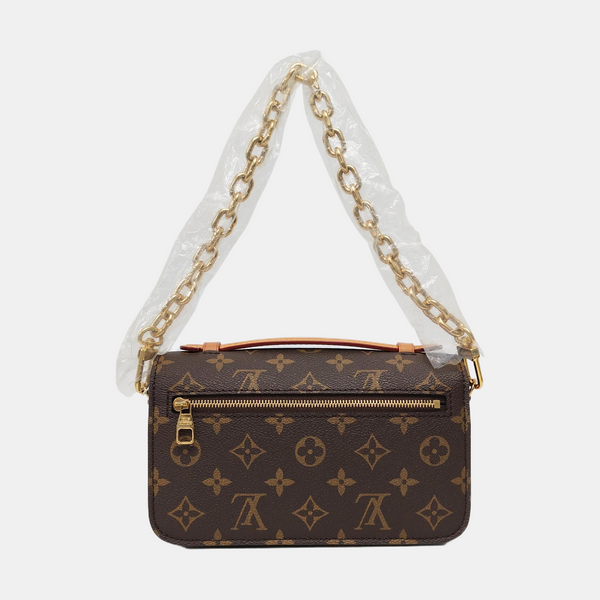 MÉTIS EAST WEST Monogram Coated Canvas Brown
