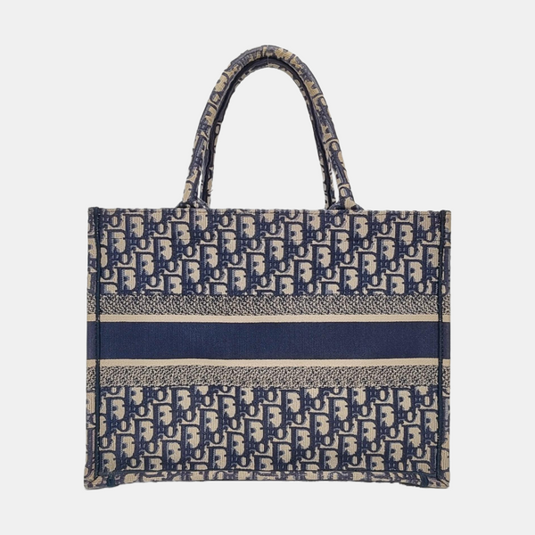 Authenticated pre-owned  Book Tote Medium Monogram Canvas Blue - Tote Bag at Looply