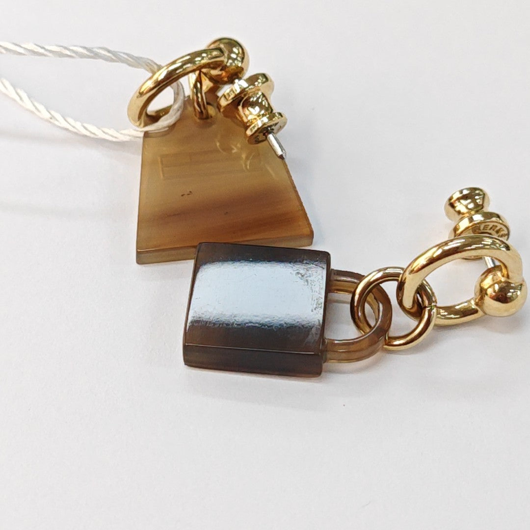 Amulette Maroquinier Metal Gold Stud Earrings