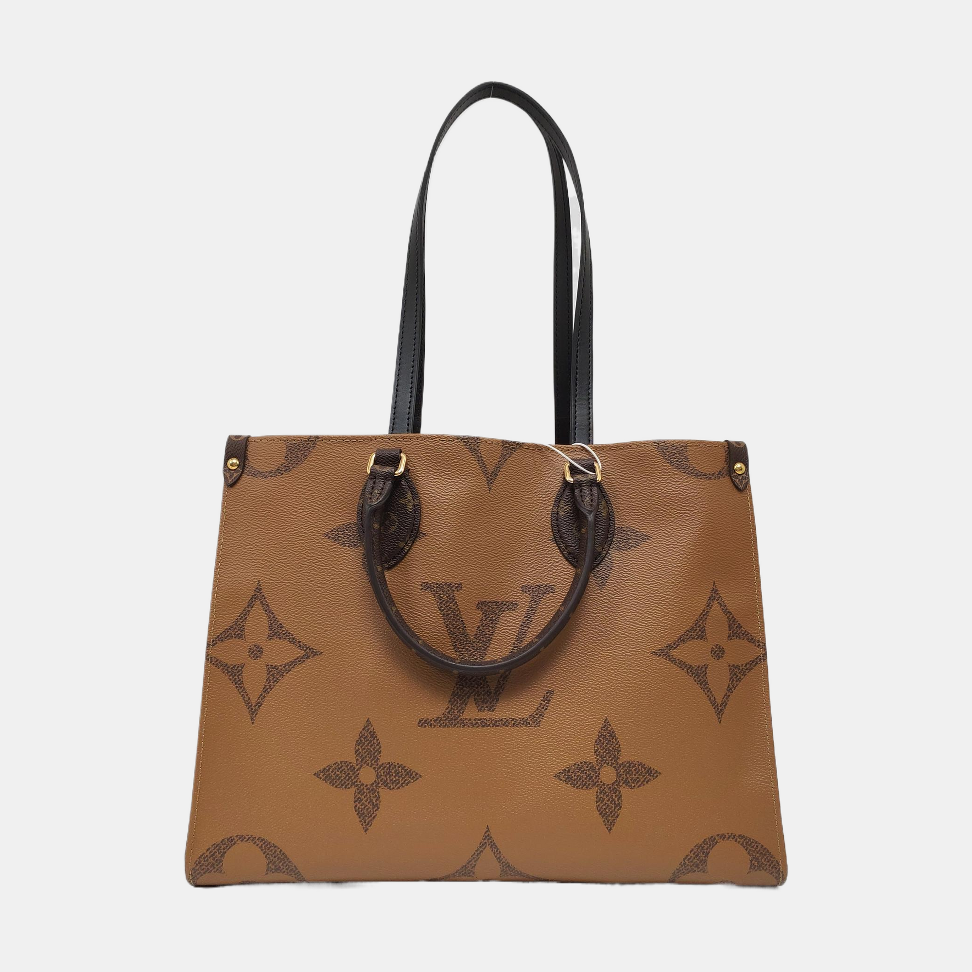 ONTHEGO MM Monogram Coated Canvas Brown
