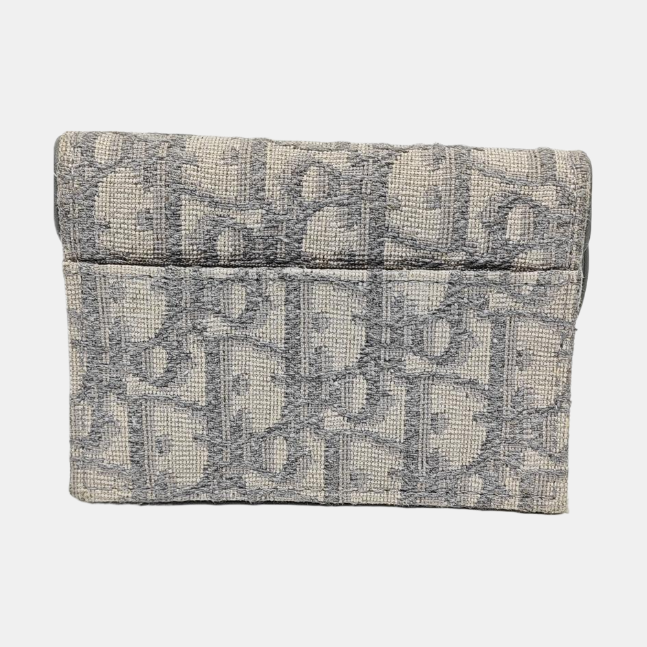 Authenticated pre-owned  Saddle Oblique Fabric Gray Card Holder - Card Holder at Looply