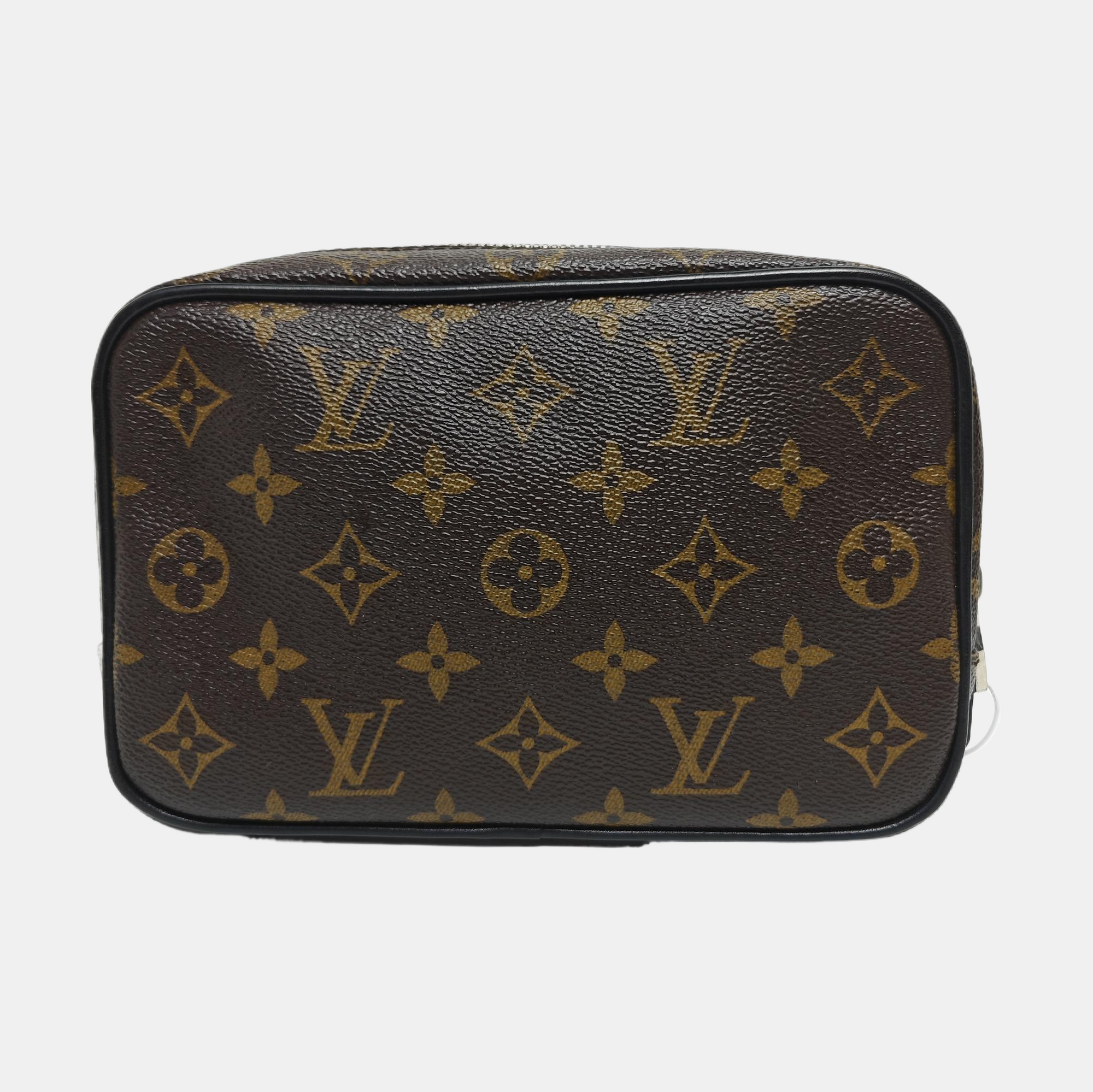 Monogram Coated Canvas Clutch PM Brown