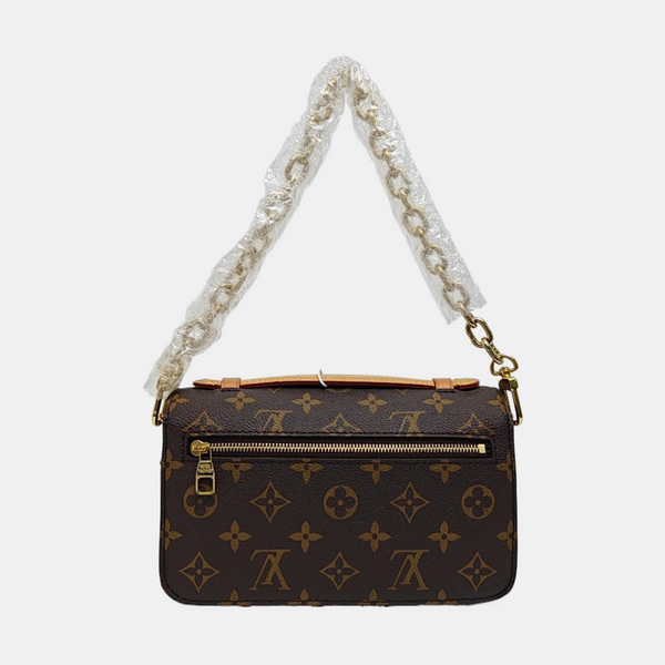 MÉTIS EAST WEST Monogram Coated Canvas Brown