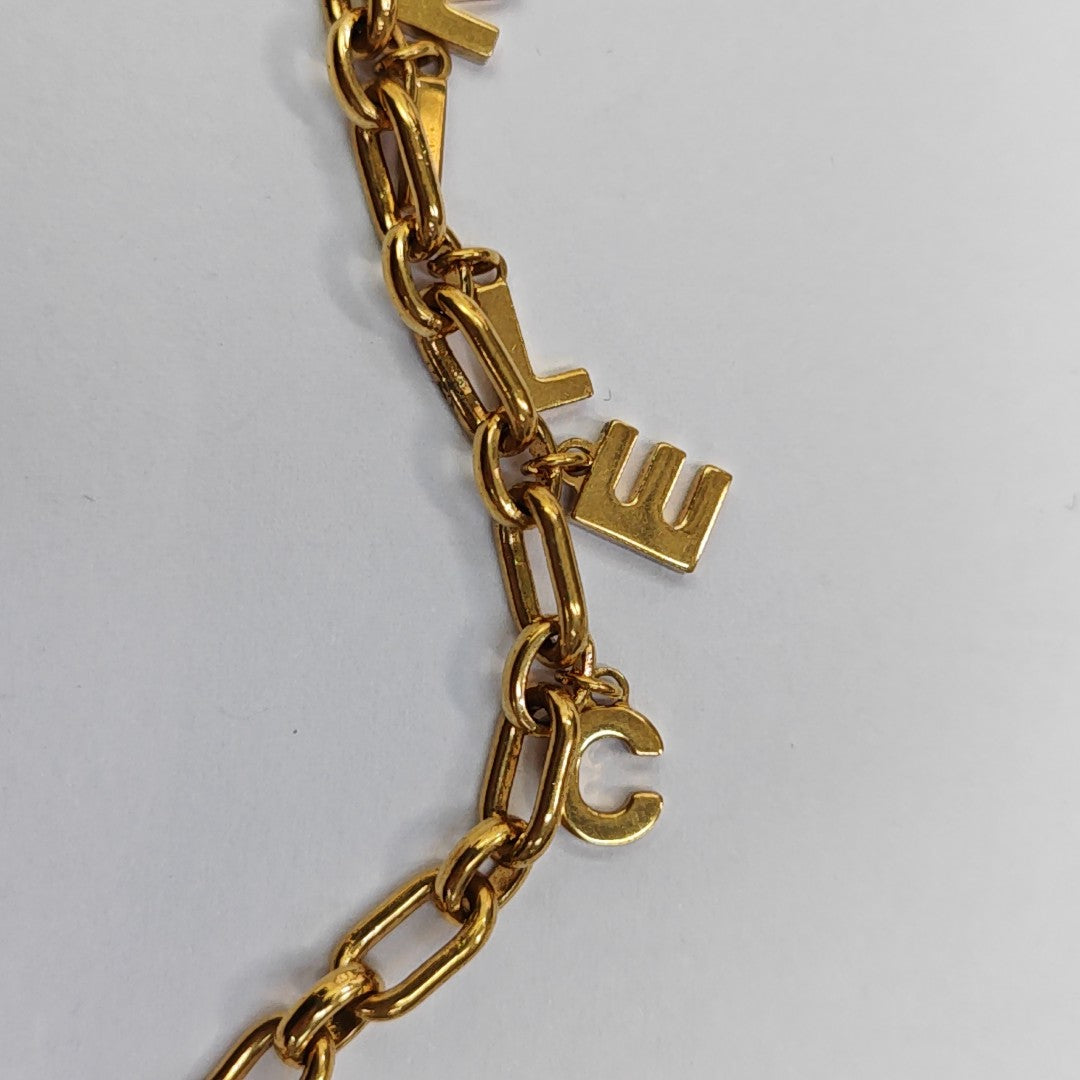 Collar de metal dorado