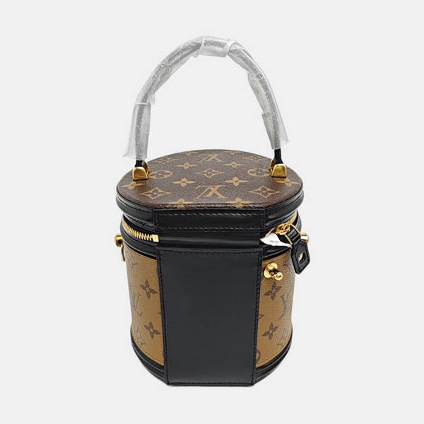 CANNES PM Monogram Coated Canvas Brown