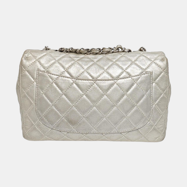 Authenticated pre-owned  CLASSIC FLAP Jumbo Quilted Lambskin Beige - Shoulder Bag at Looply