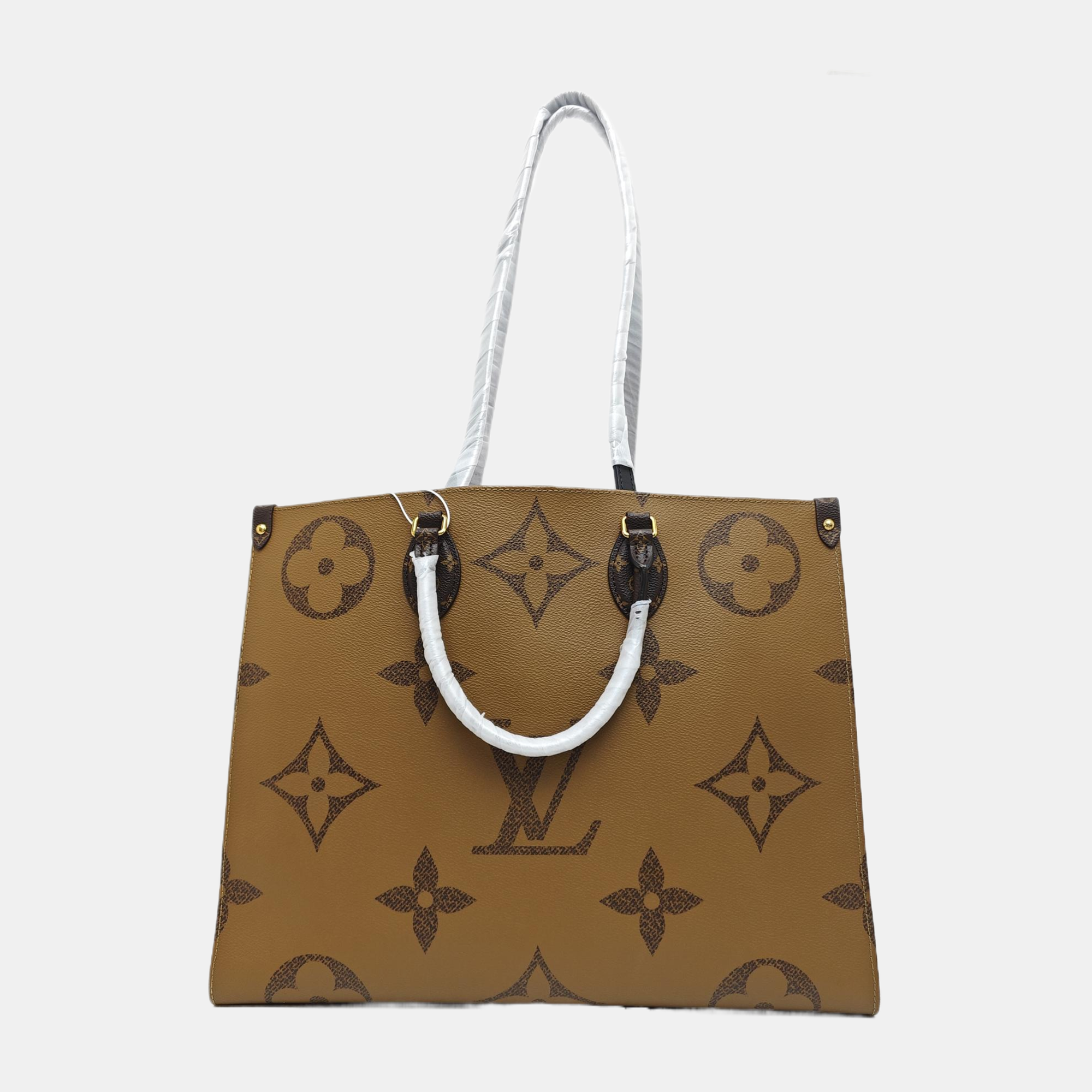 ONTHEGO GM Monogram Coated Canvas Brown