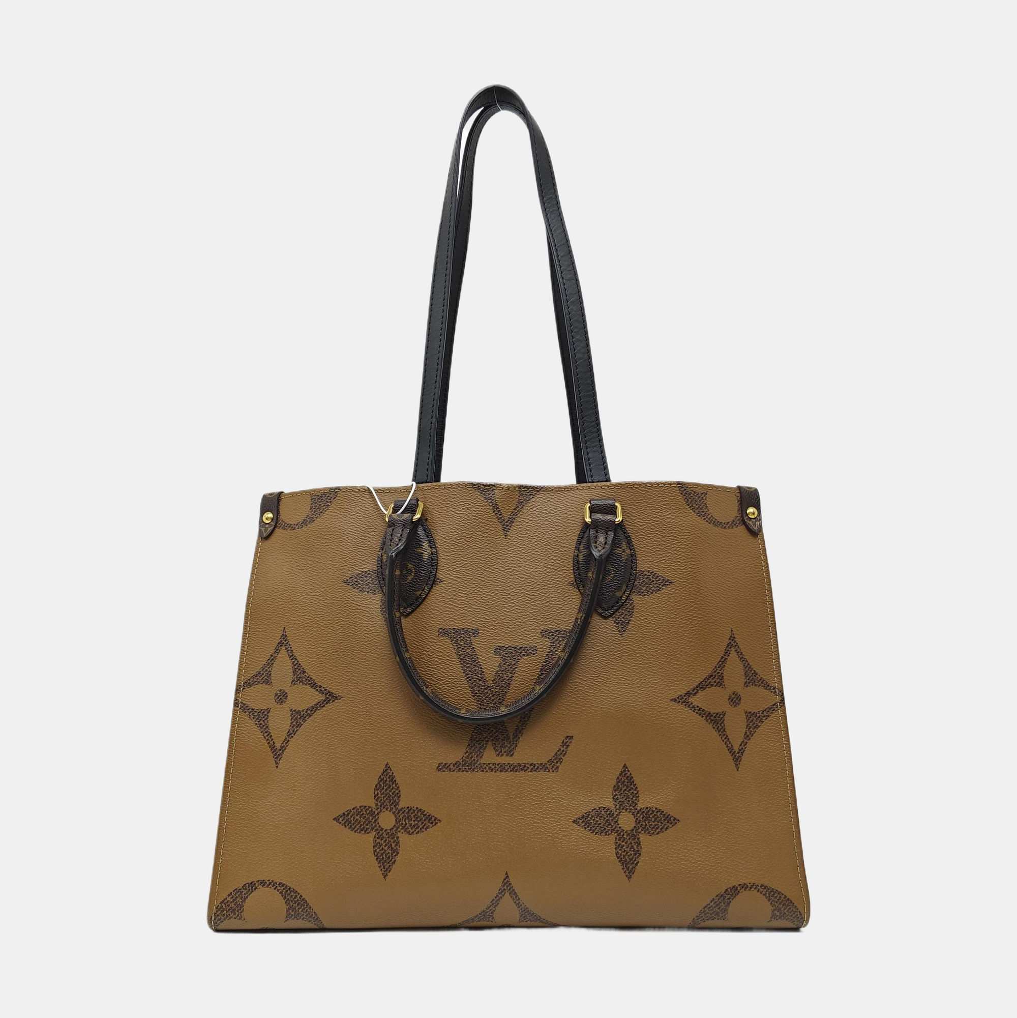 ONTHEGO MM Monogram Coated Canvas Brown