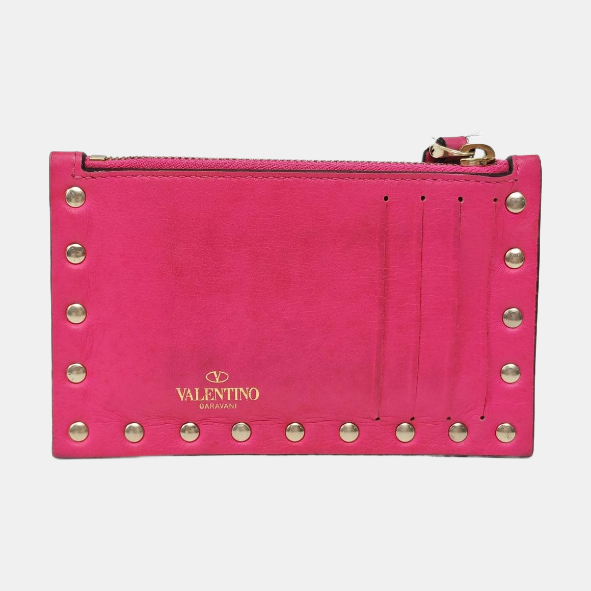 Authenticated pre-owned  Rockstud Calfskin Pink - Clutch at Looply