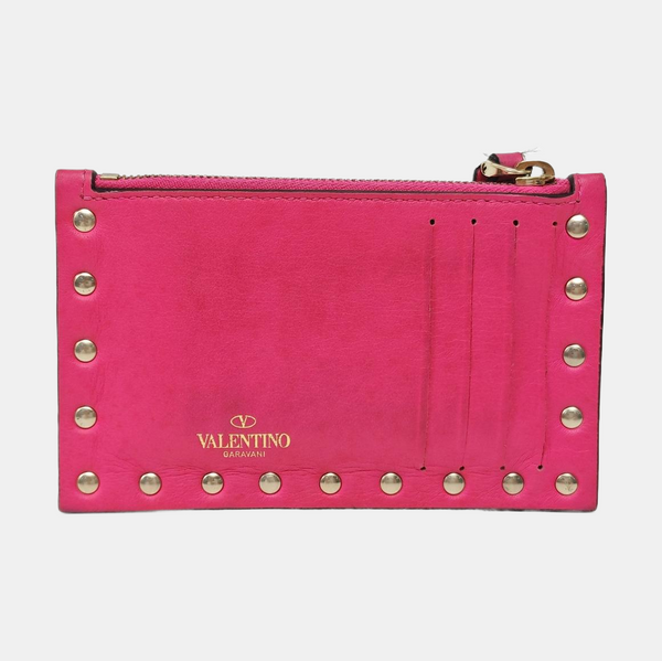 Authenticated pre-owned  Rockstud Calfskin Pink - Clutch at Looply