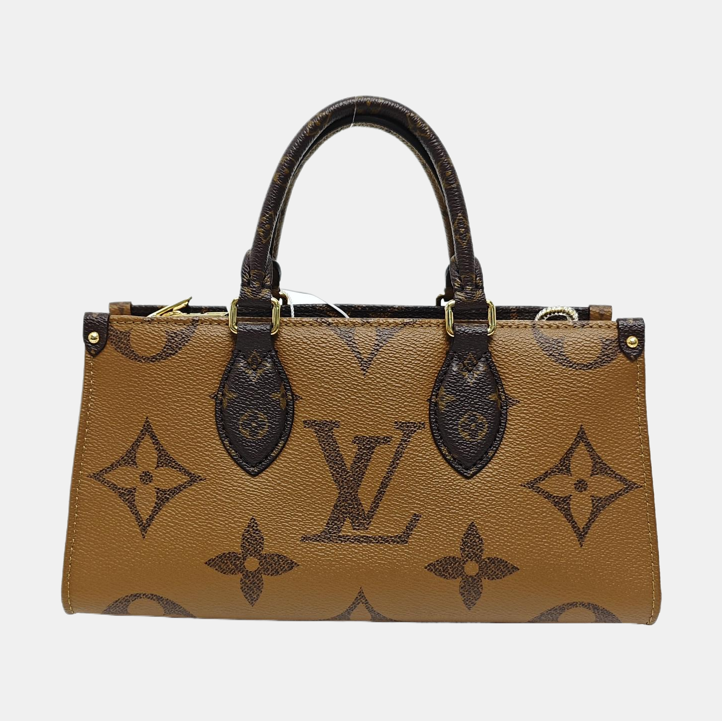 ONTHEGO EAST WEST PM Monogram Coated Canvas Brown