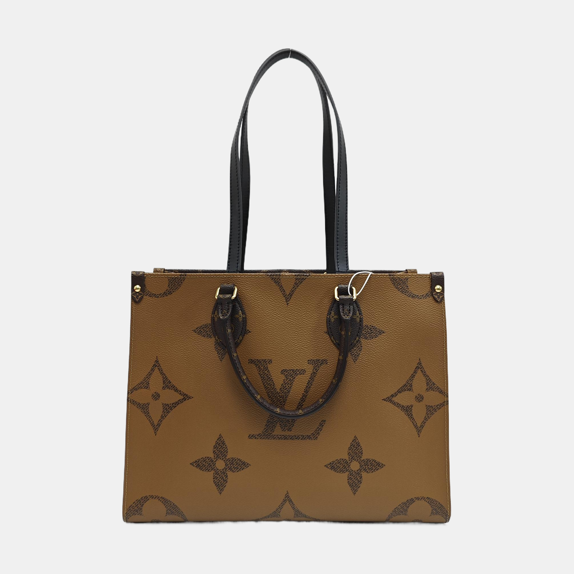 ONTHEGO MM Monogram Coated Canvas Brown