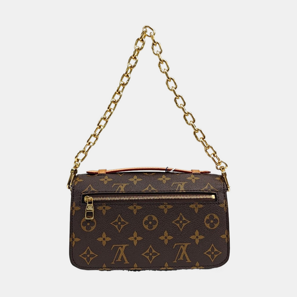 MÉTIS EAST WEST Monogram Coated Canvas Brown