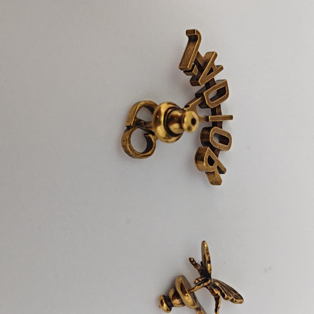 J'adior Metal Gold Stud Earrings