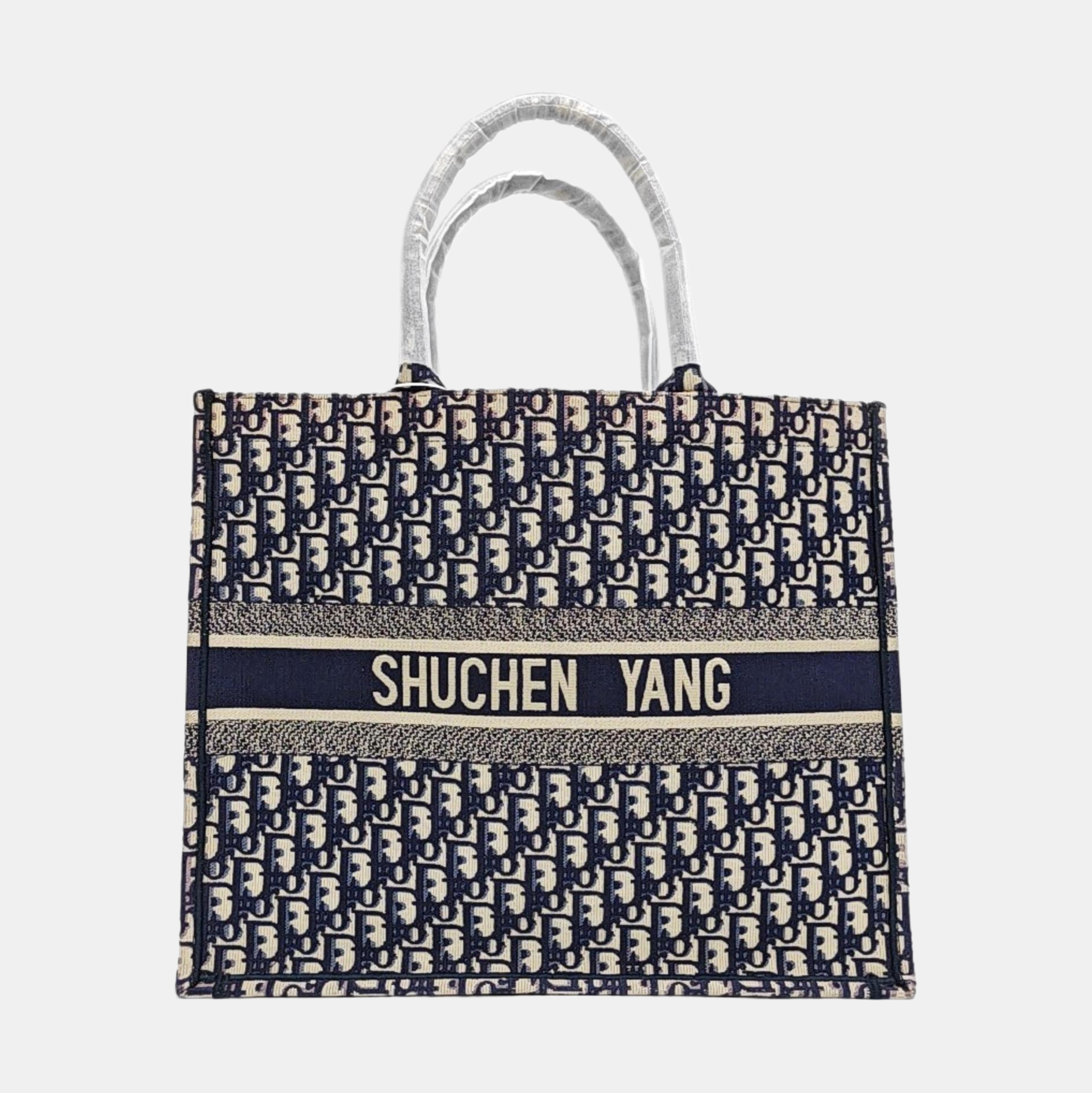 Authenticated pre-owned  Book Tote Large Monogram Canvas Beige - Tote Bag at Looply