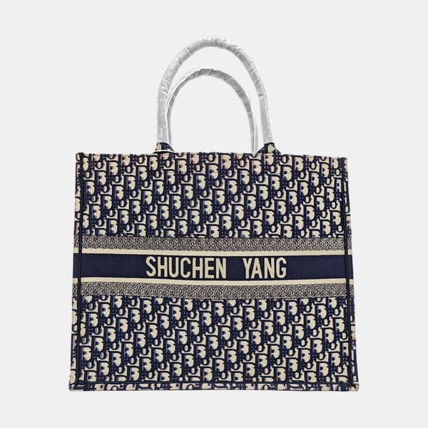 Authenticated pre-owned  Book Tote Large Monogram Canvas Beige - Tote Bag at Looply