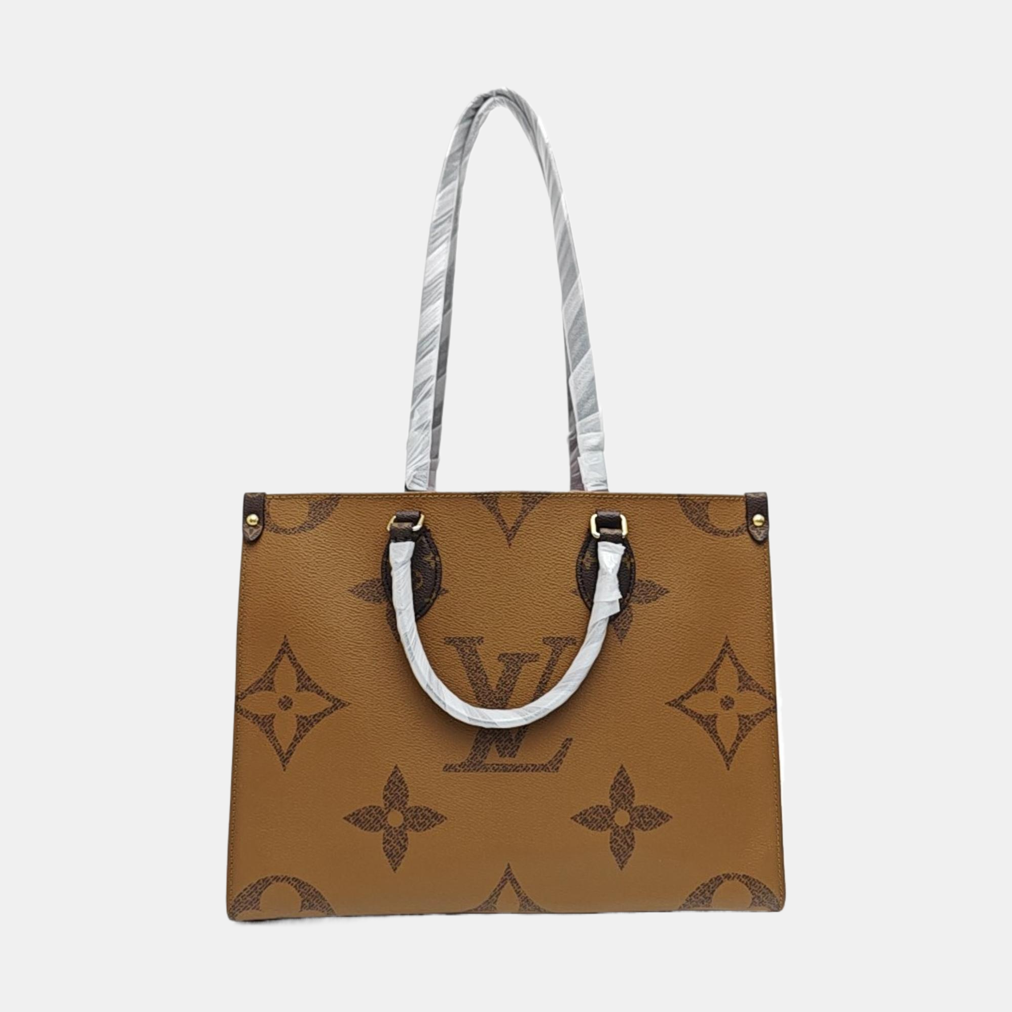 ONTHEGO MM Monogram Coated Canvas Brown