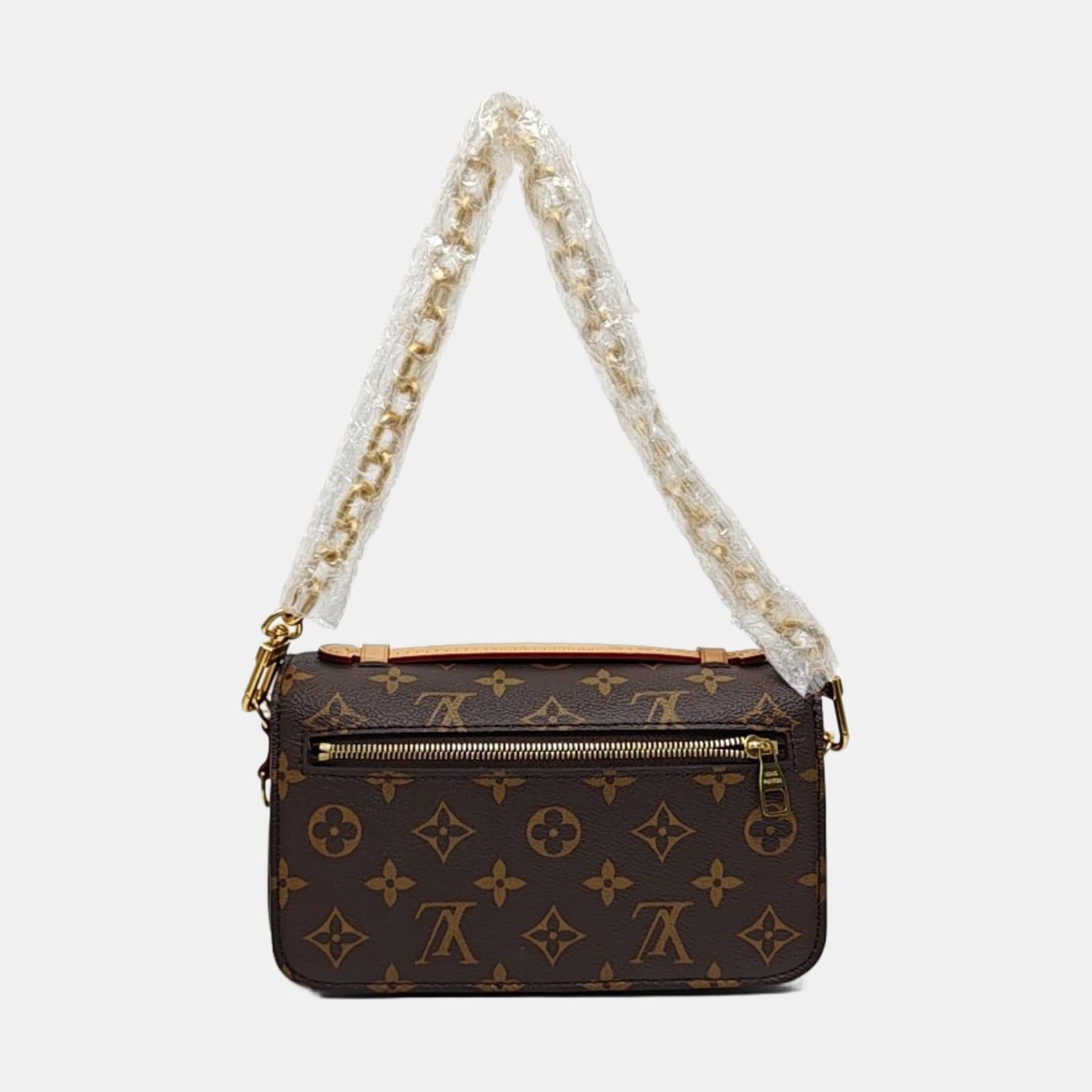 MÉTIS EAST WEST Monogram Coated Canvas Brown