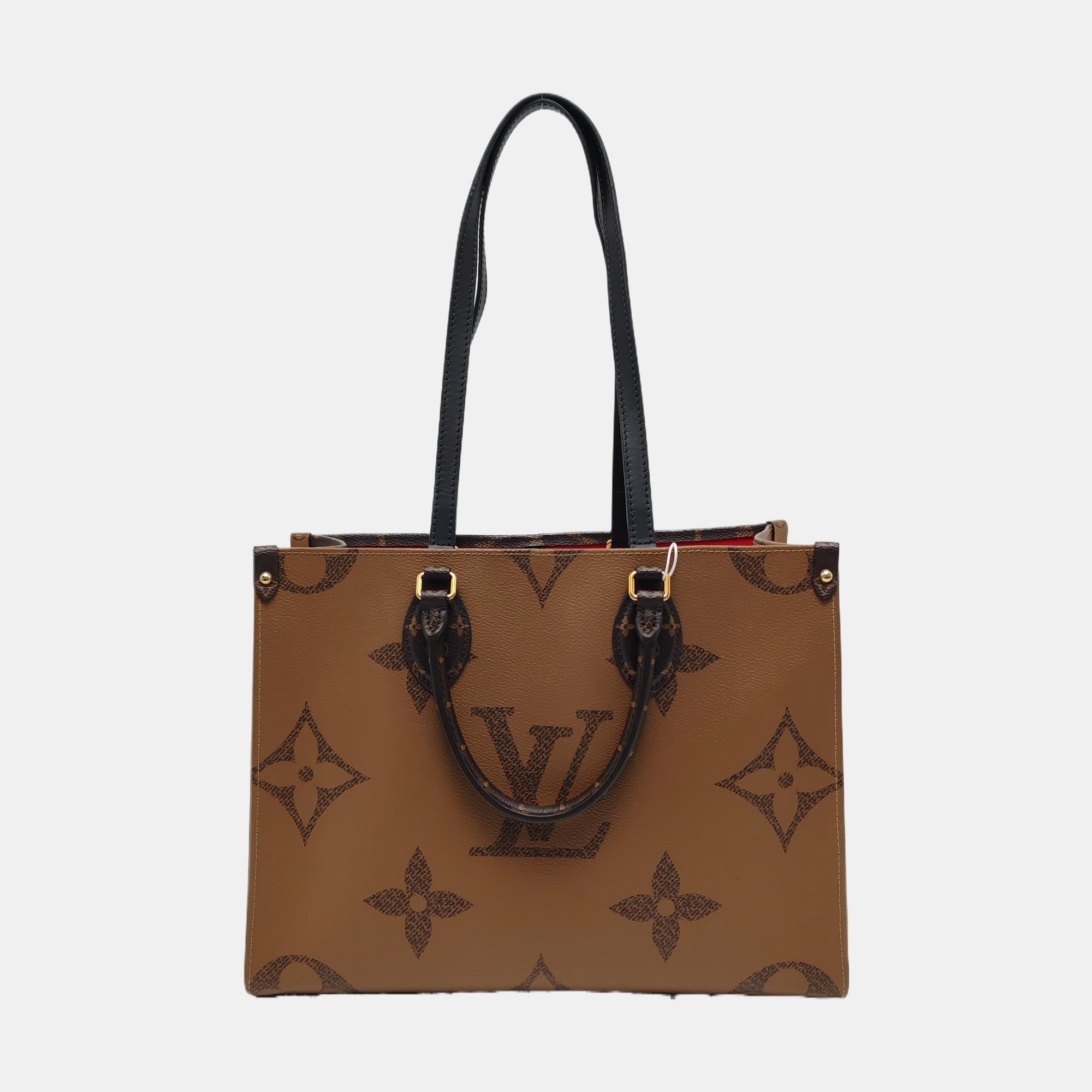 ONTHEGO MM Monogram Coated Canvas Brown