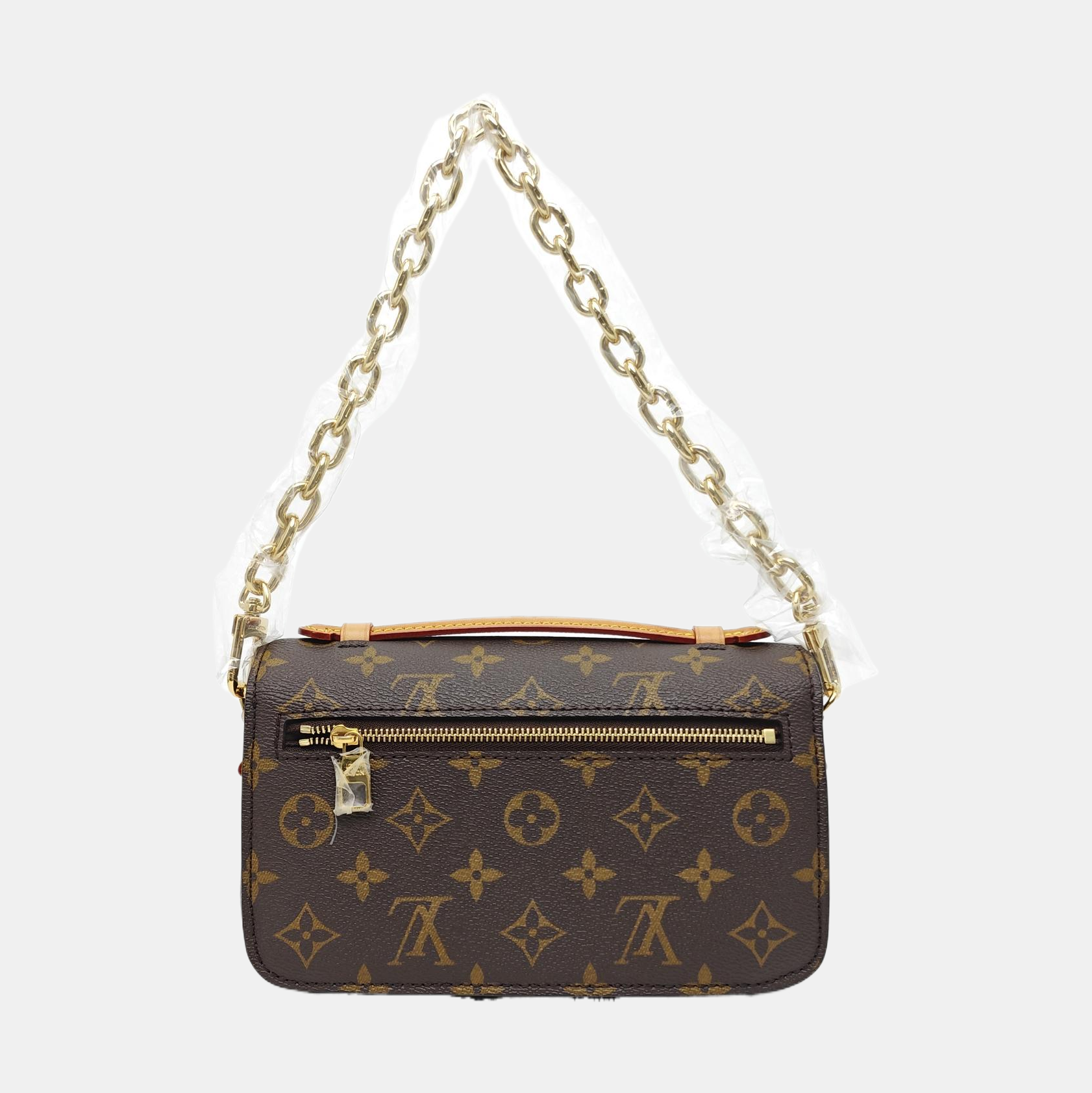 MÉTIS EAST WEST Monogram Coated Canvas Brown