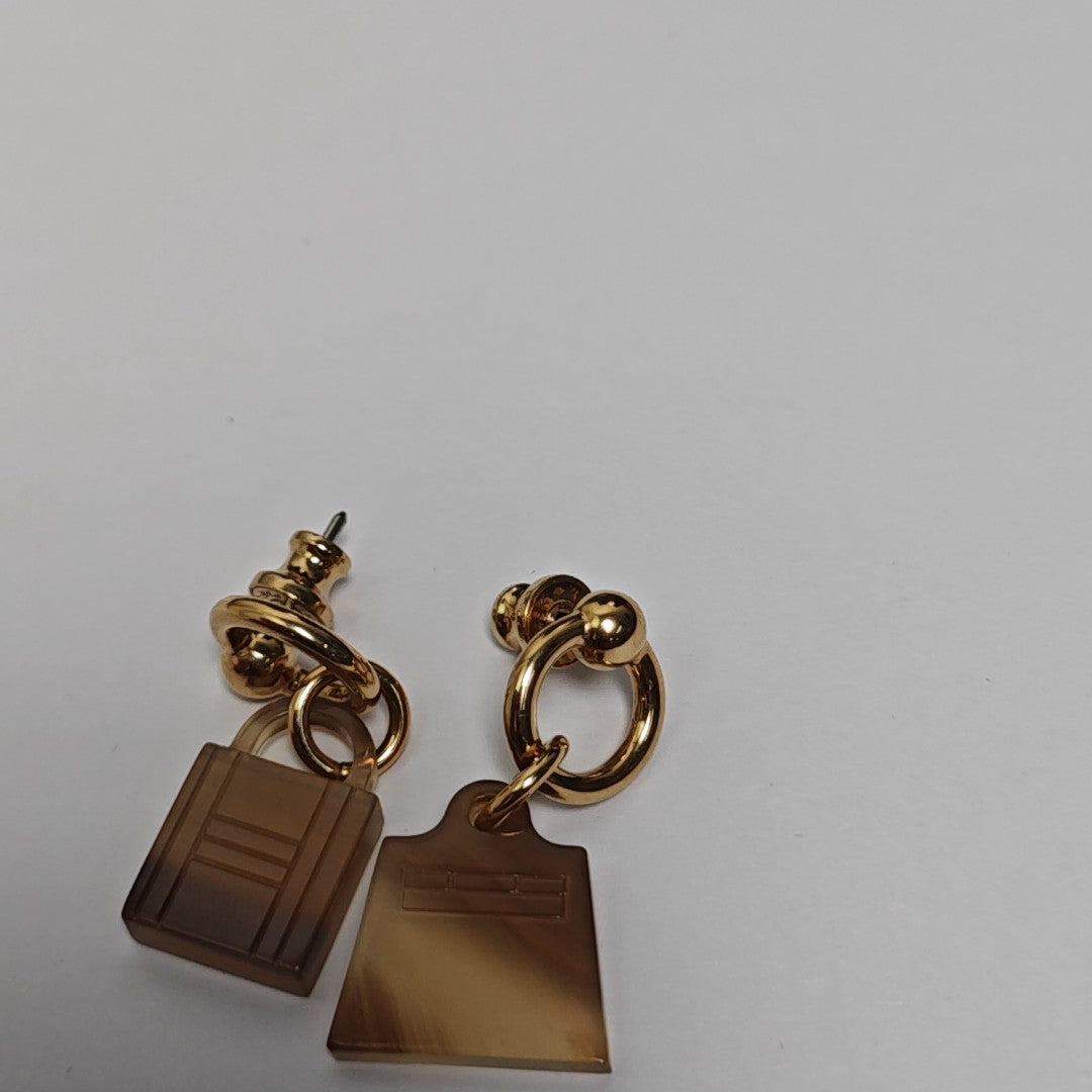 Amulette Maroquinier Metal Brown Stud Earrings