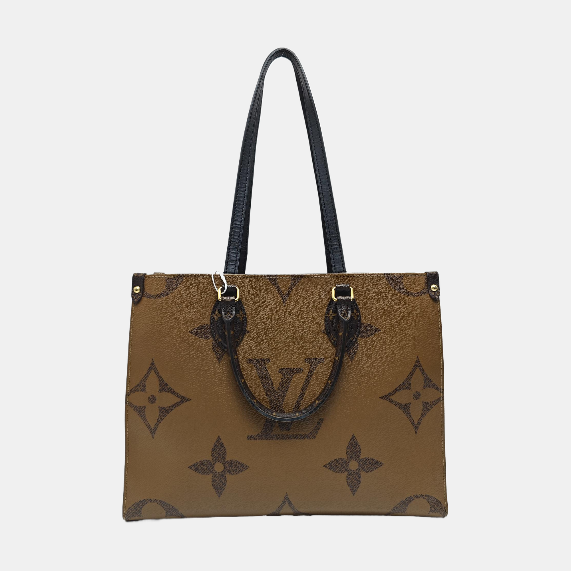 ONTHEGO MM Monogram Coated Canvas Brown