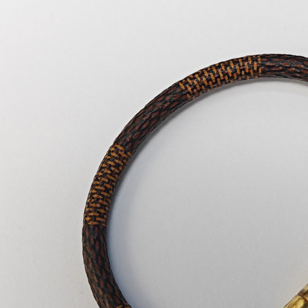 CONFIDENTIEL Metal Brown Bangle