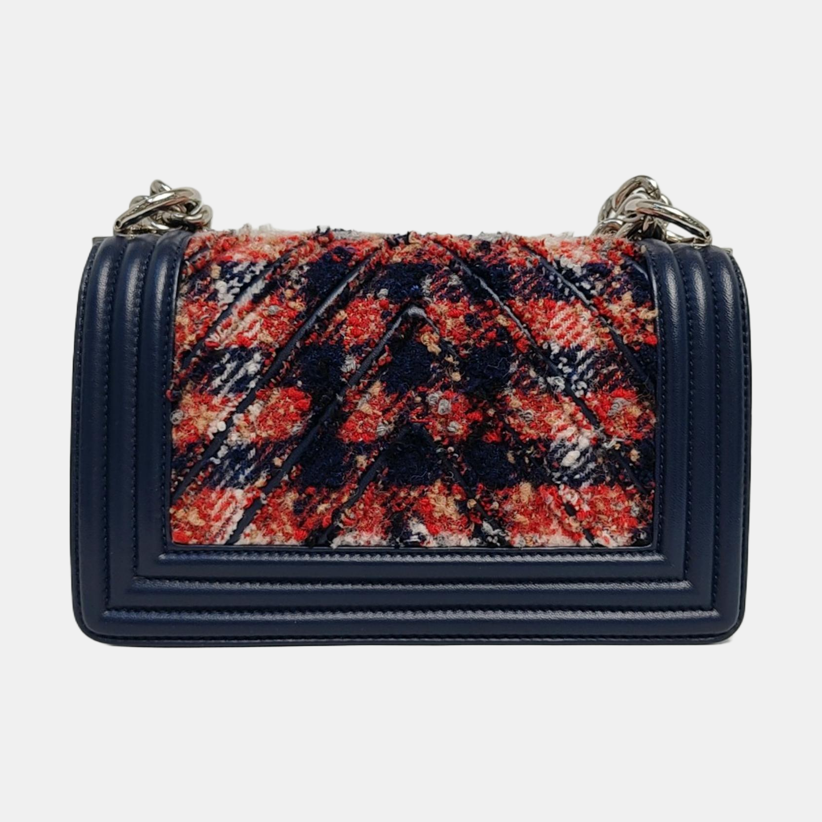 Authenticated pre-owned  BOY CHANEL Small Chevron, Quilted Wool Blue - Shoulder Bag at Looply