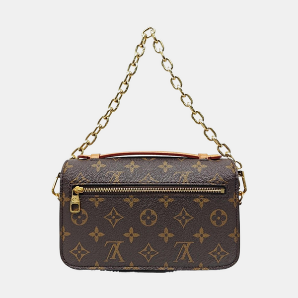 MÉTIS EAST WEST Monogram Coated Canvas Brown