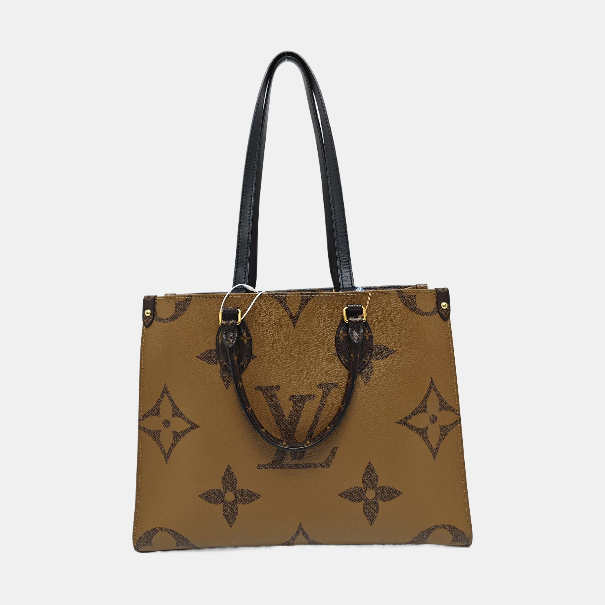 ONTHEGO MM Monogram Coated Canvas Brown