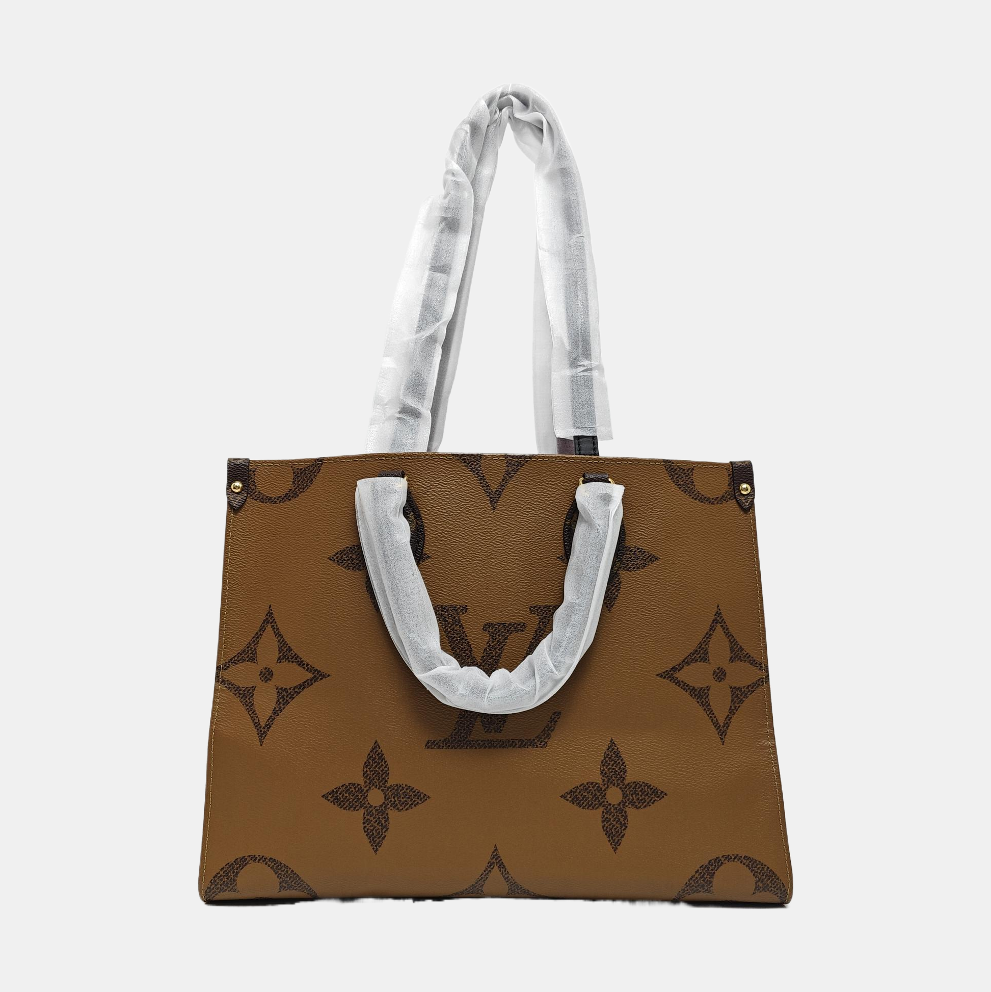 ONTHEGO MM Monogram Coated Canvas Brown
