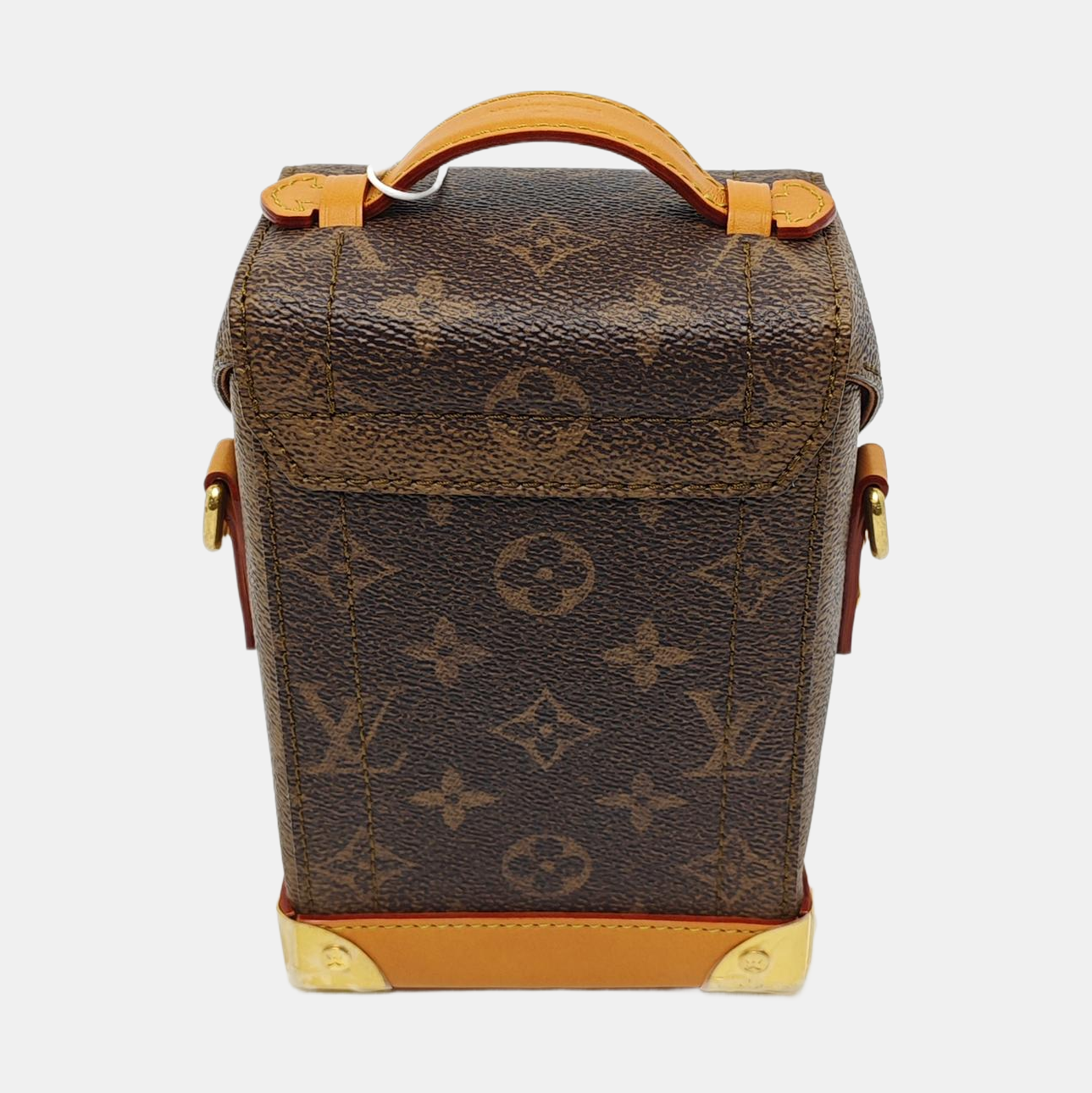 TRUNK Monogram Coated Canvas Brown