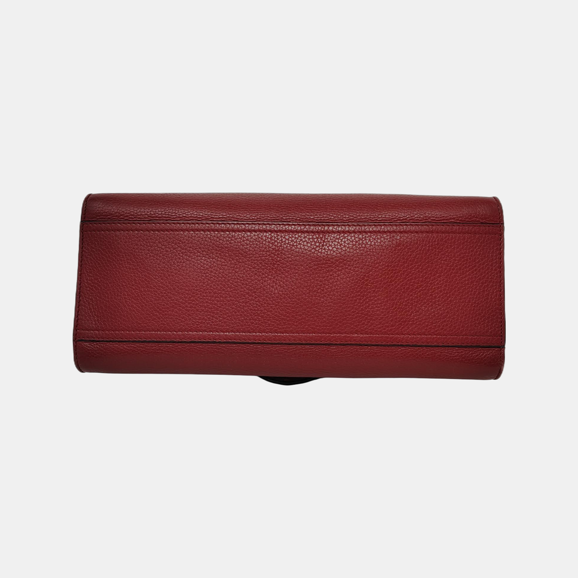 Authenticated pre-owned  GG Marmont Top Handle Small Calfskin Red - Shoulder Bag at Looply