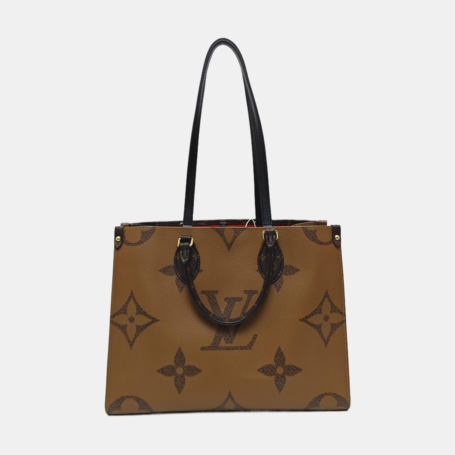 ONTHEGO MM Monogram Coated Canvas Brown