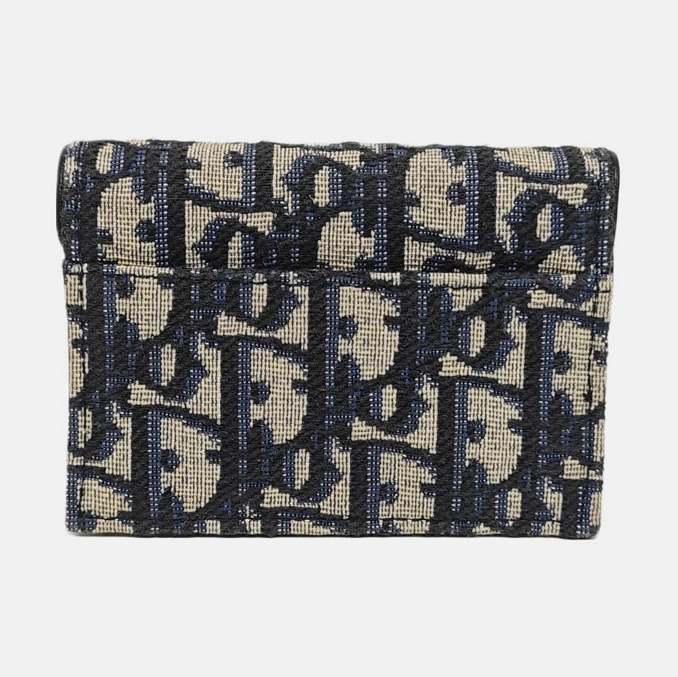 Authenticated pre-owned  Saddle Monogram Canvas Blue Card Holder - Card Holder at Looply