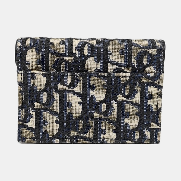Authenticated pre-owned  Saddle Monogram Canvas Blue Card Holder - Card Holder at Looply