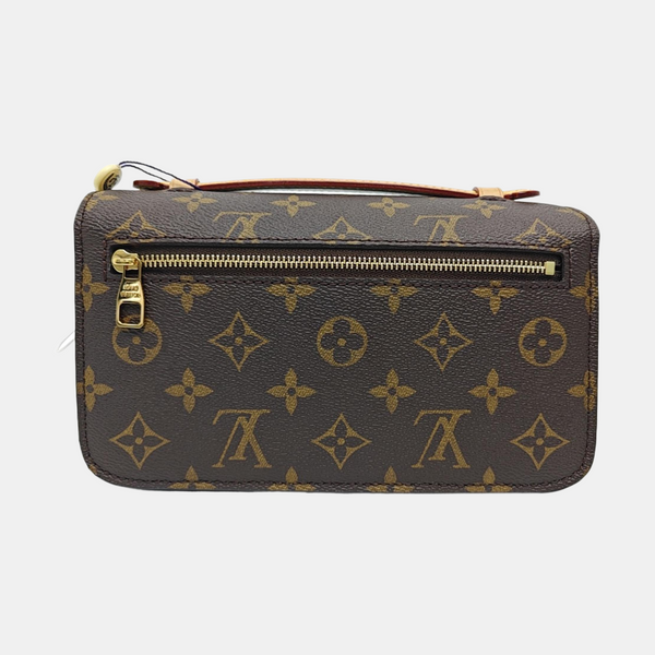 MÉTIS EAST WEST Monogram Coated Canvas Brown