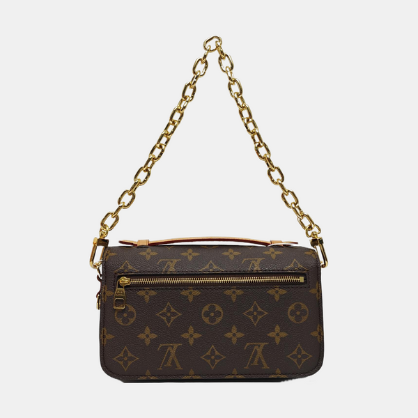 MÉTIS EAST WEST Monogram Coated Canvas Brown
