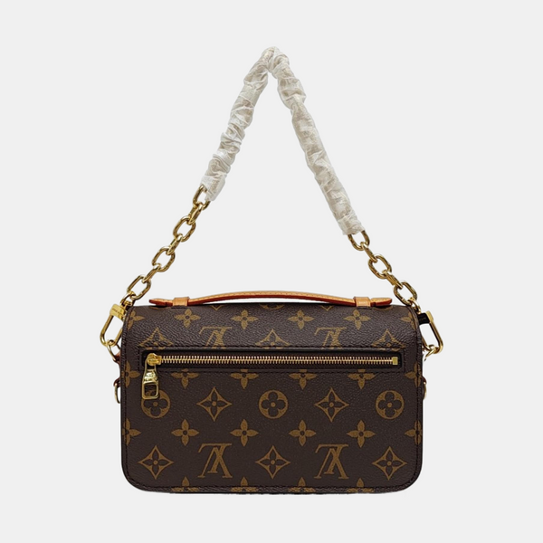 MÉTIS EAST WEST Monogram Coated Canvas Brown