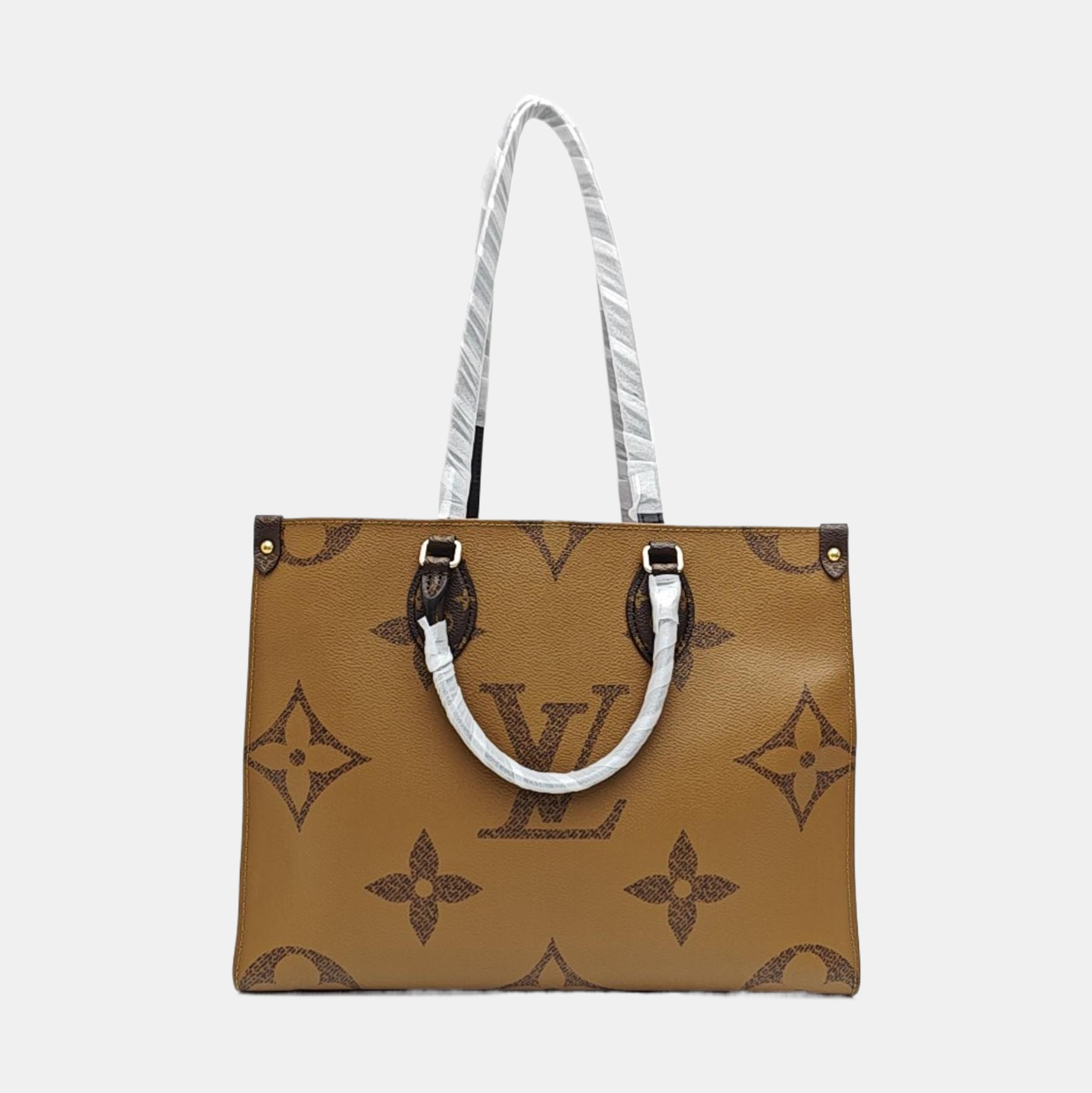 ONTHEGO MM Monogram Coated Canvas Brown