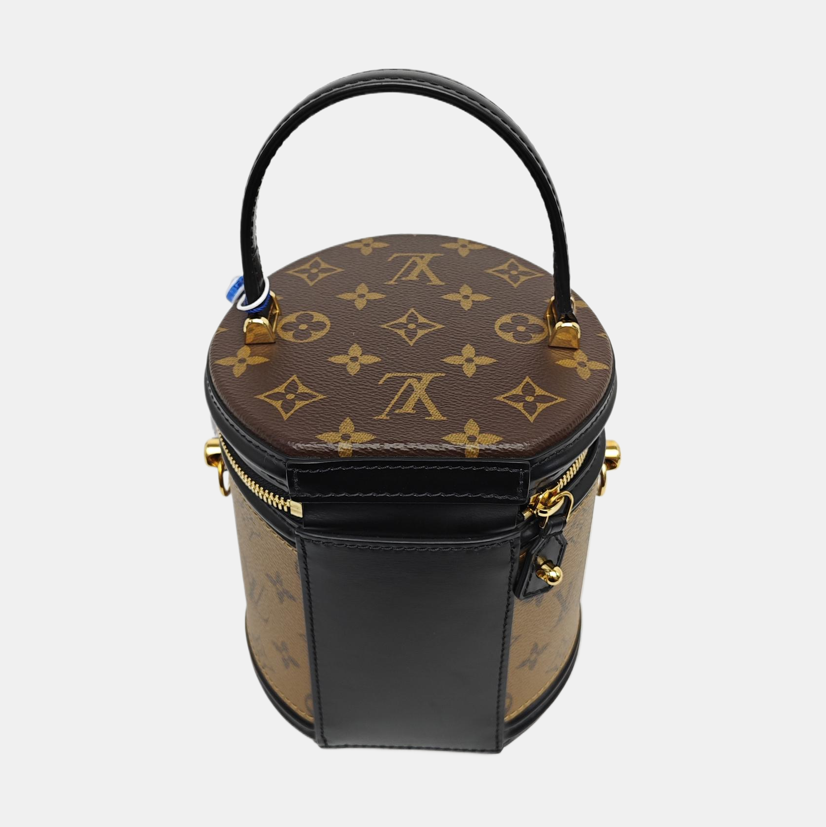 CANNES PM Monogram Coated Canvas Brown