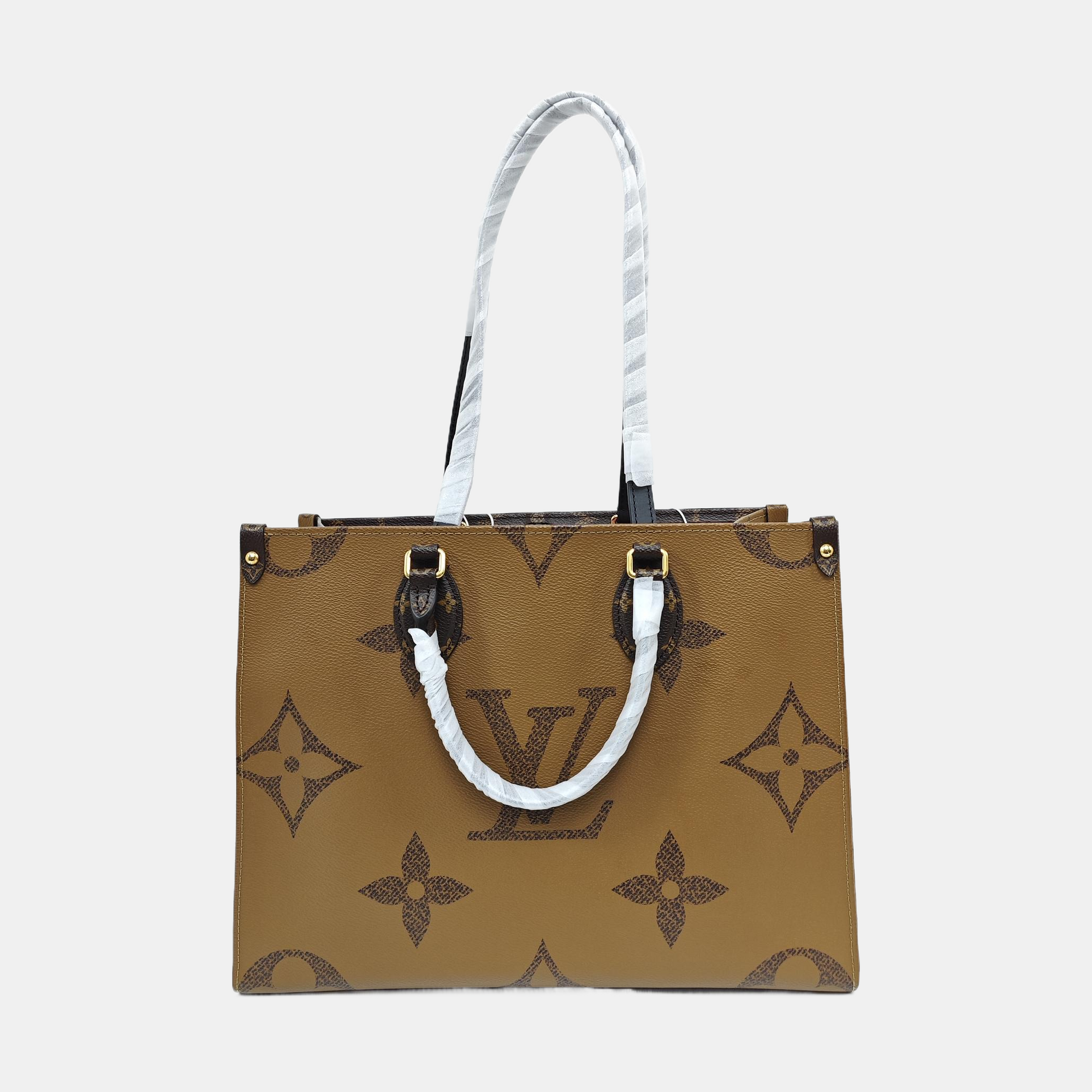ONTHEGO MM Monogram Coated Canvas Brown