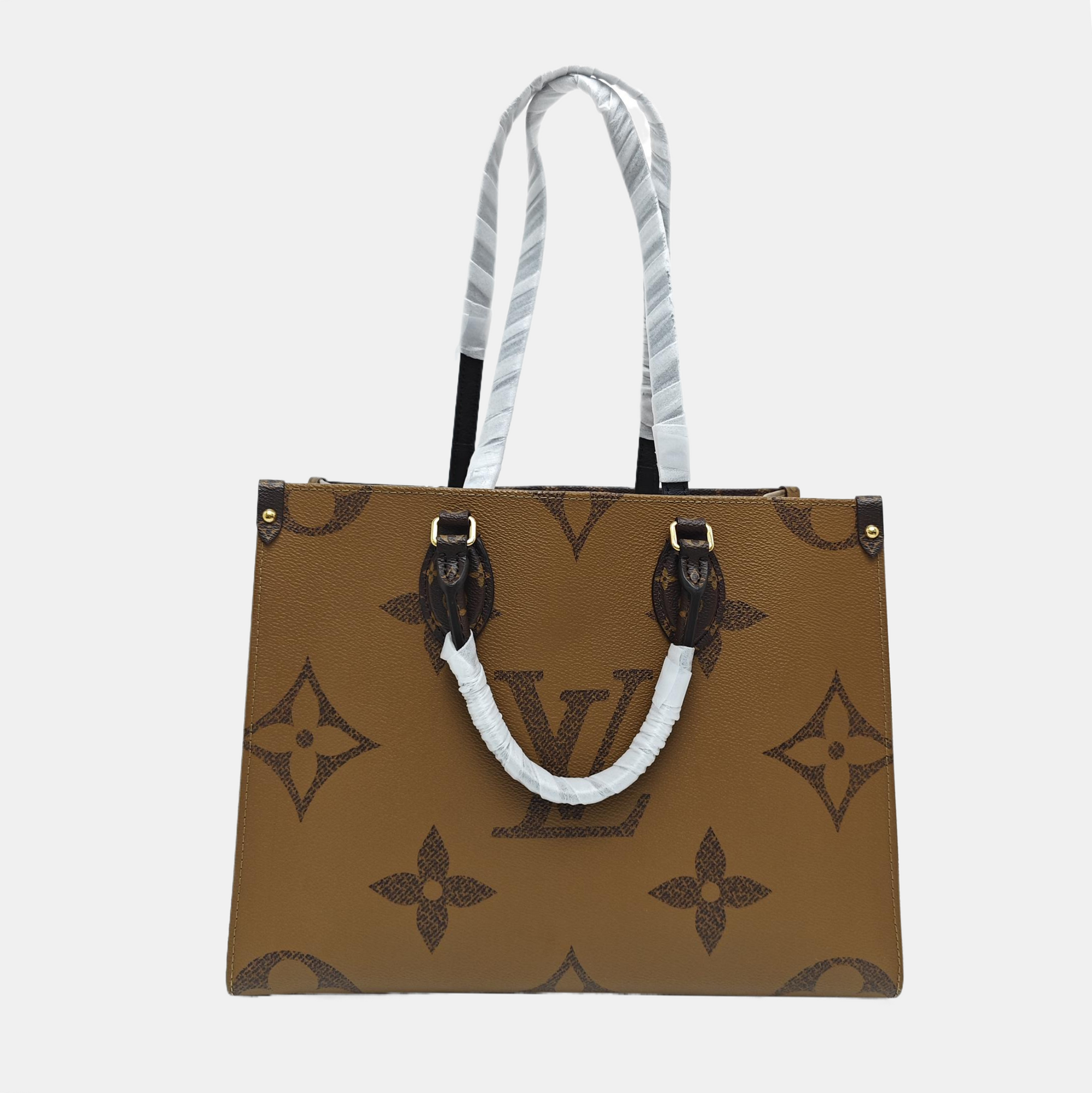 ONTHEGO MM Monogram Coated Canvas Brown
